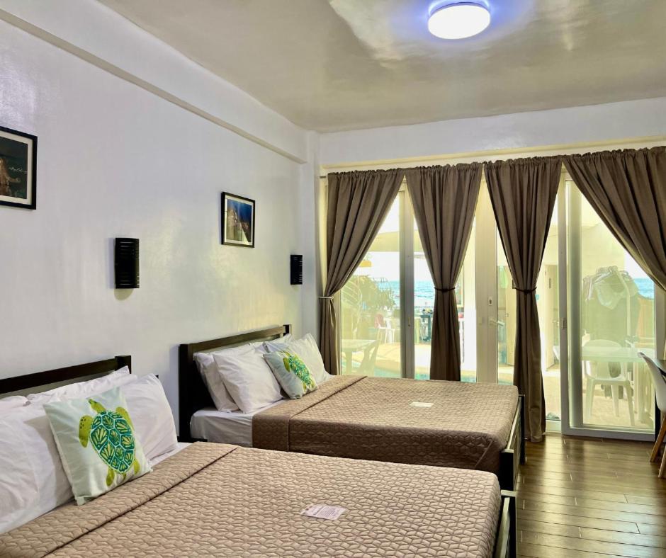 פוארטו גאלרה Arkipelago Beach Resort מראה חיצוני תמונה